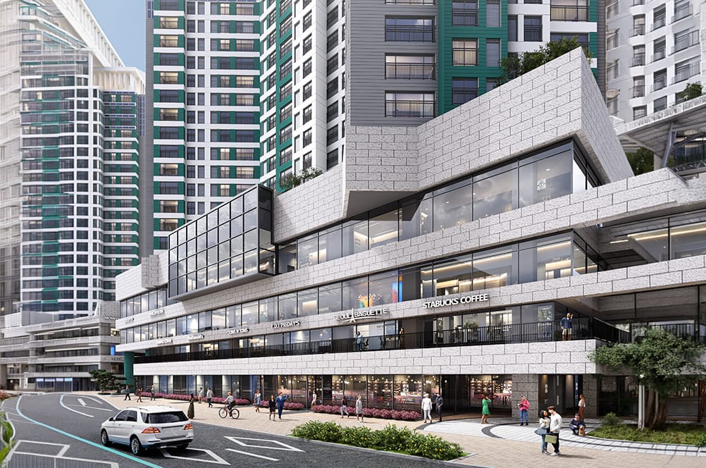 현대적인 고층 건물과 상업 공간이 어우러진 도시 풍경. 스타벅스와 다양한 상점들이 있는 1층, 사람들과 차량이 오가는 활기찬 거리 모습.